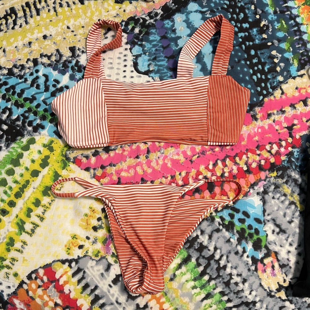 Stone fox swim bikini, medium bottom, large top. Never worn